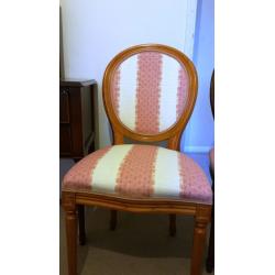 Two padded wooden chairs in excellent condition