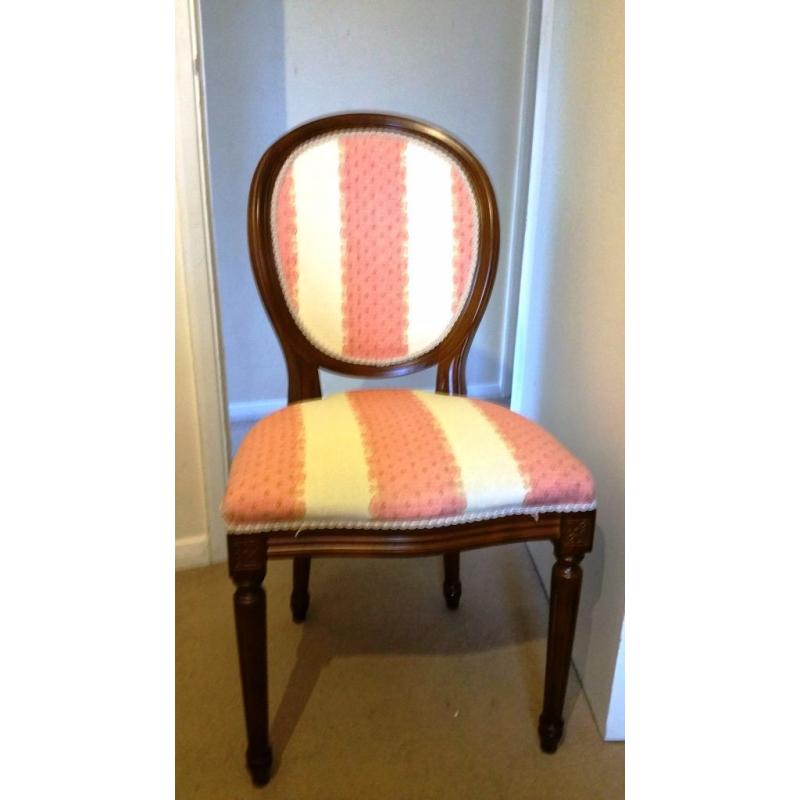 Two padded wooden chairs in excellent condition