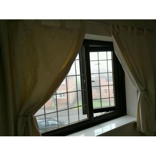 Cream tab top curtains