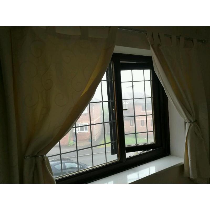 Cream tab top curtains