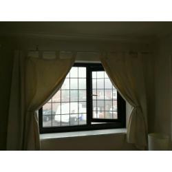 Cream tab top curtains