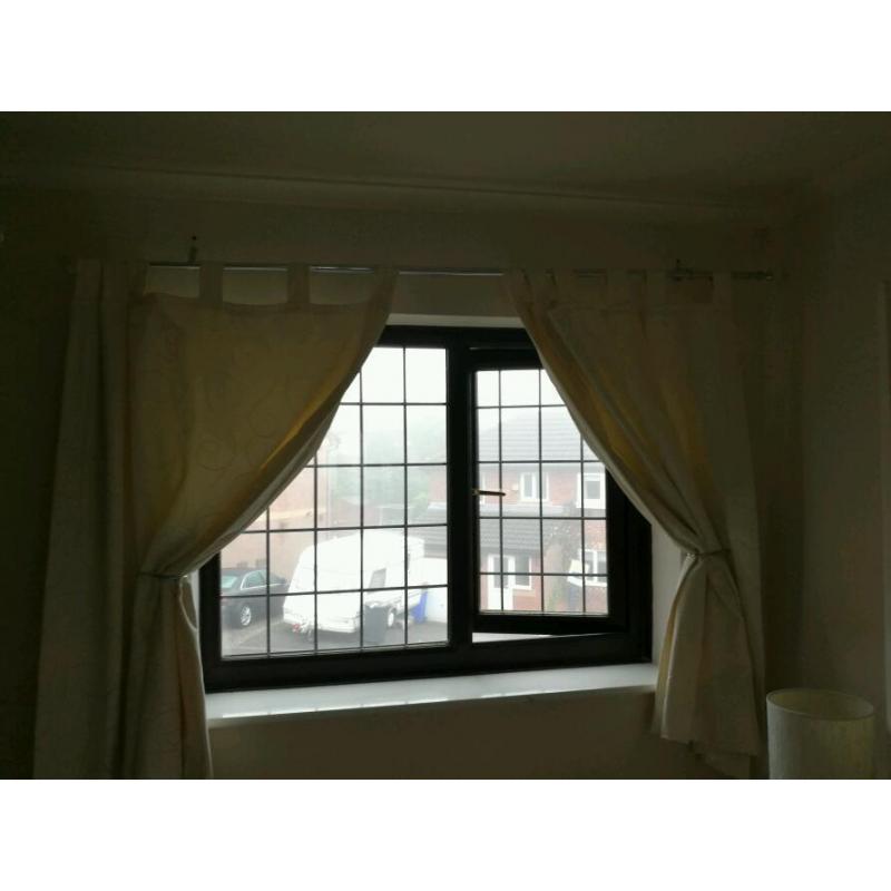 Cream tab top curtains