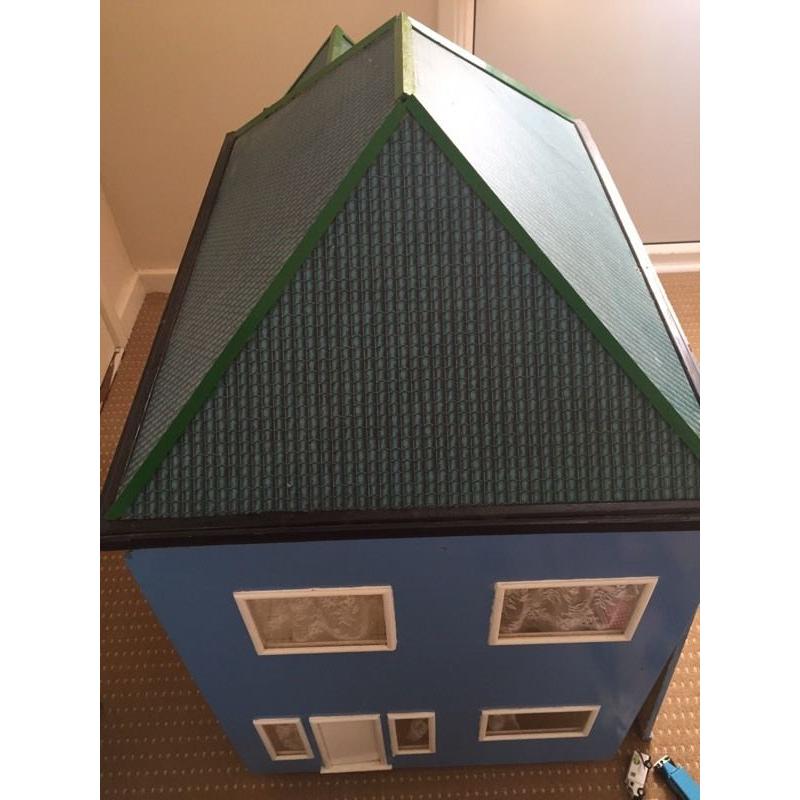 Large wooden dolls house