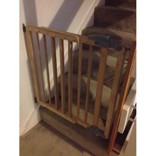 Mama's and Papa's adjustable locking stair gates.