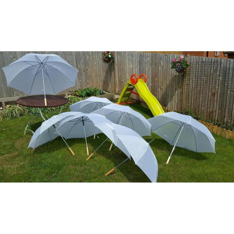 8 white umbrellas