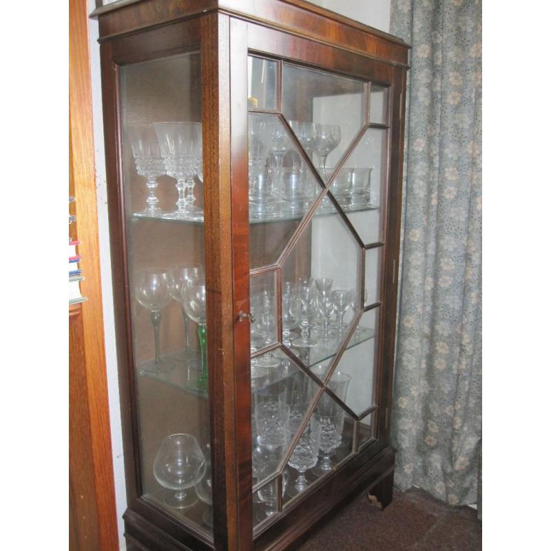 Dark wood and glass display cabinet