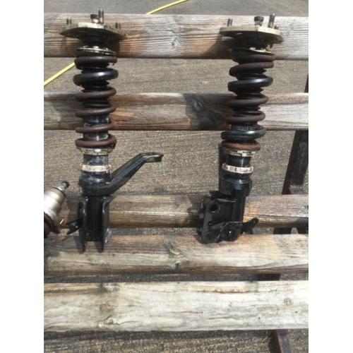 BC Racing Coilovers fully adjustable. Height and damper setting. Along with camber. Honda ep civic