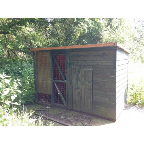 Dog kennel and new roll of felt