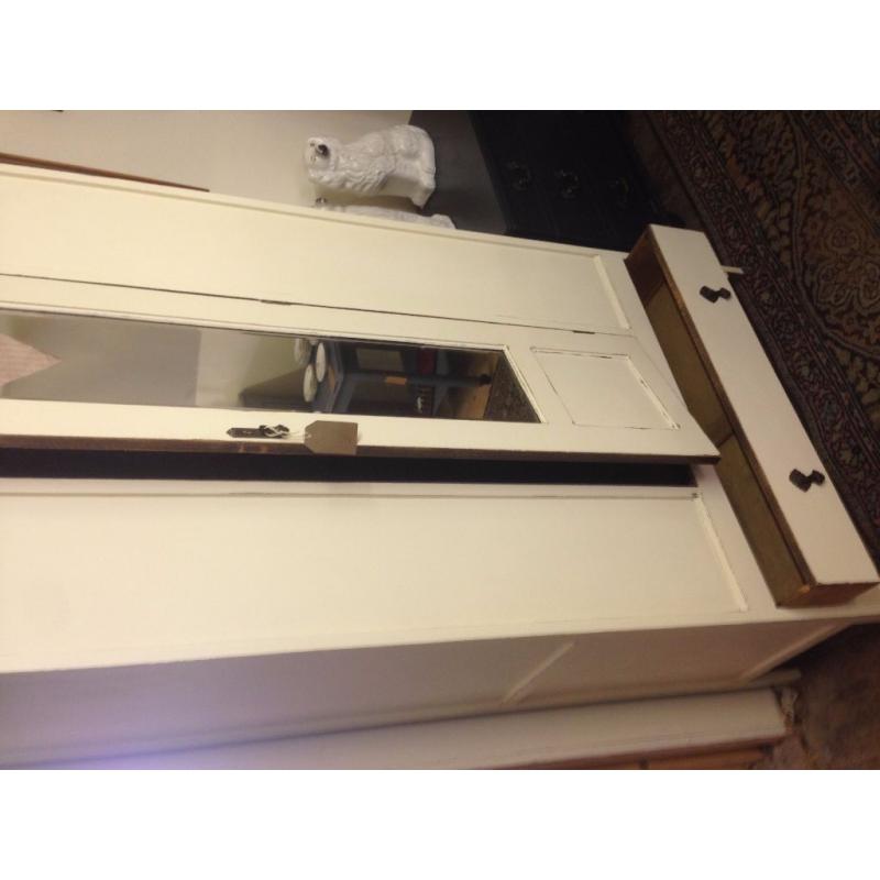 small cream painted wardrobe