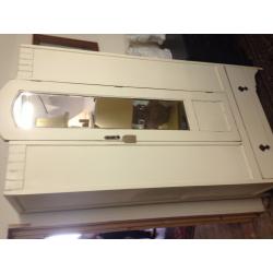 small cream painted wardrobe