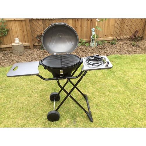 ELECTRIC BBQ (FIRE MOUNTAIN) COOK OUTSIDE OR INSIDE.