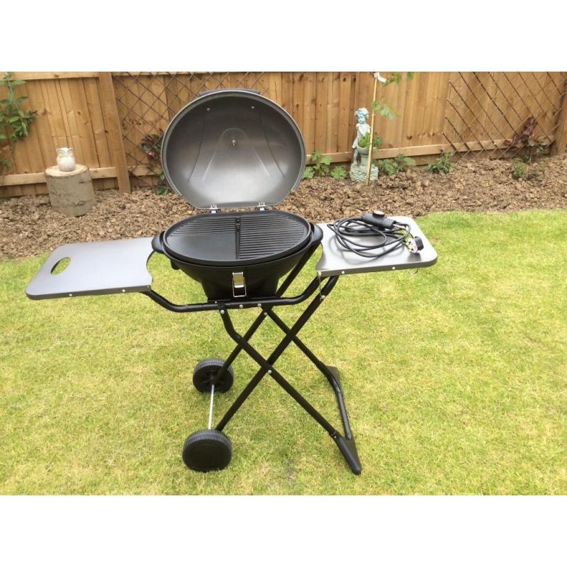 ELECTRIC BBQ (FIRE MOUNTAIN) COOK OUTSIDE OR INSIDE.