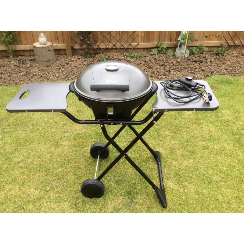 ELECTRIC BBQ (FIRE MOUNTAIN) COOK OUTSIDE OR INSIDE.