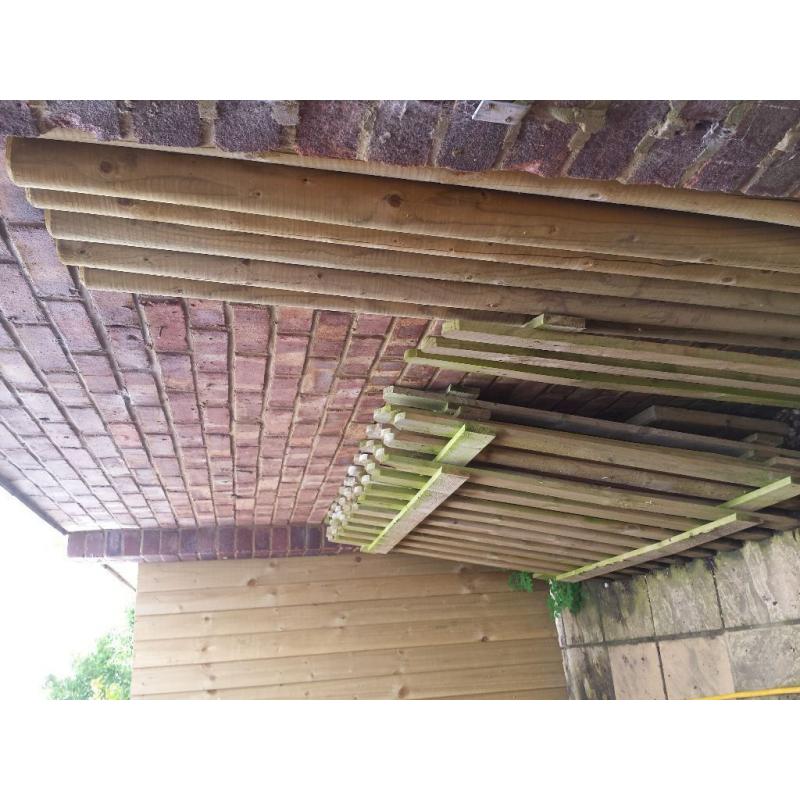 set of wooden fences and solid wood posts
