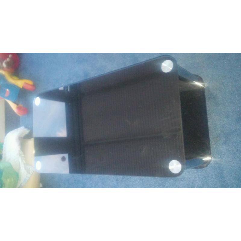 Black glass coffee table with crome legs