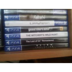 Playstation 4 with 2 controllers and 7 games