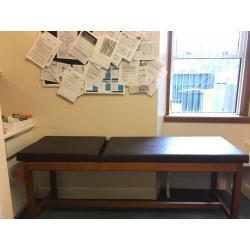 Brown Examination couch. Examination couch suitable for massage or other therapeutic use