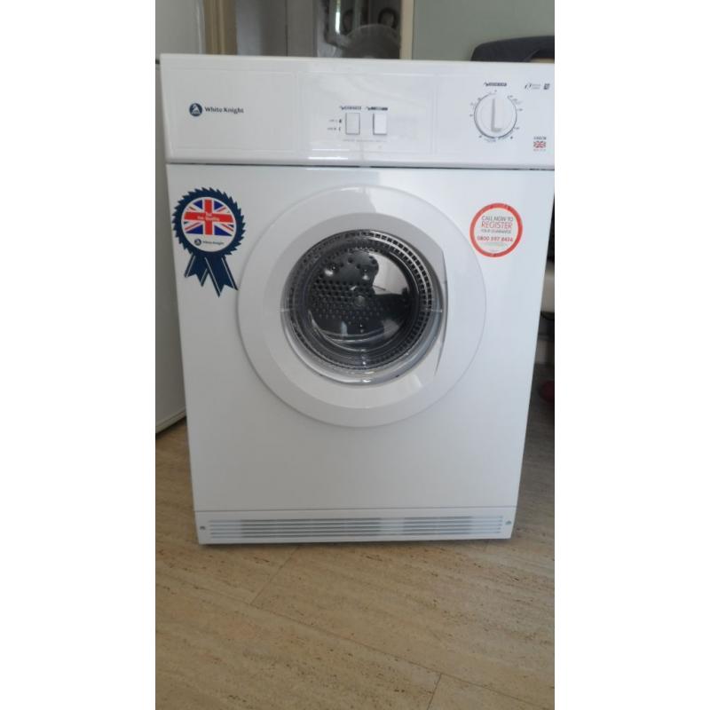 unused brand new large load tumble dryer with built in pull out venting kit