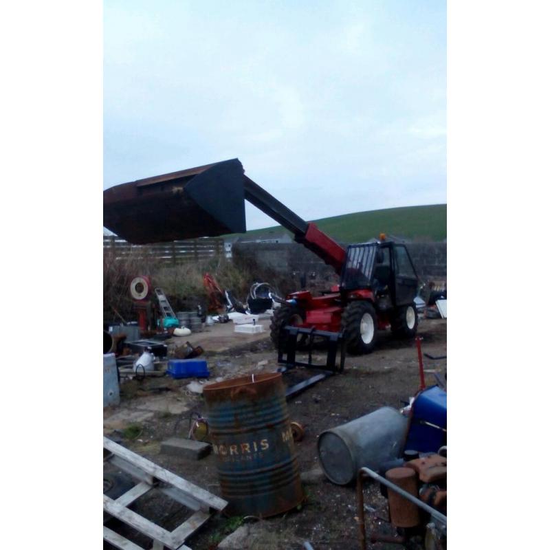 Manitou forklift with long forks and bucket for sale