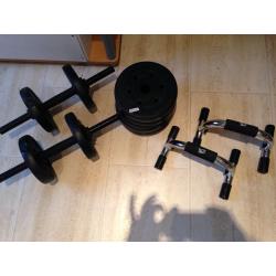 Gym at home equipment - dumbbells, plates - weights - and push up handles