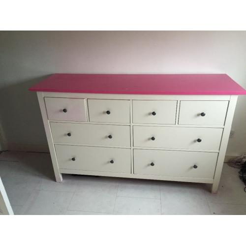 white chest of drawers with pink top