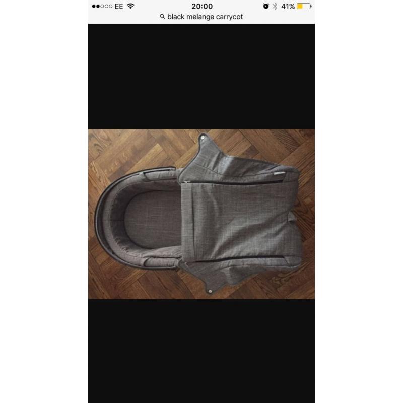 Stokke carry cot in black melange with raincover