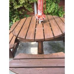 Outside cedar wood table Seats 8 easy