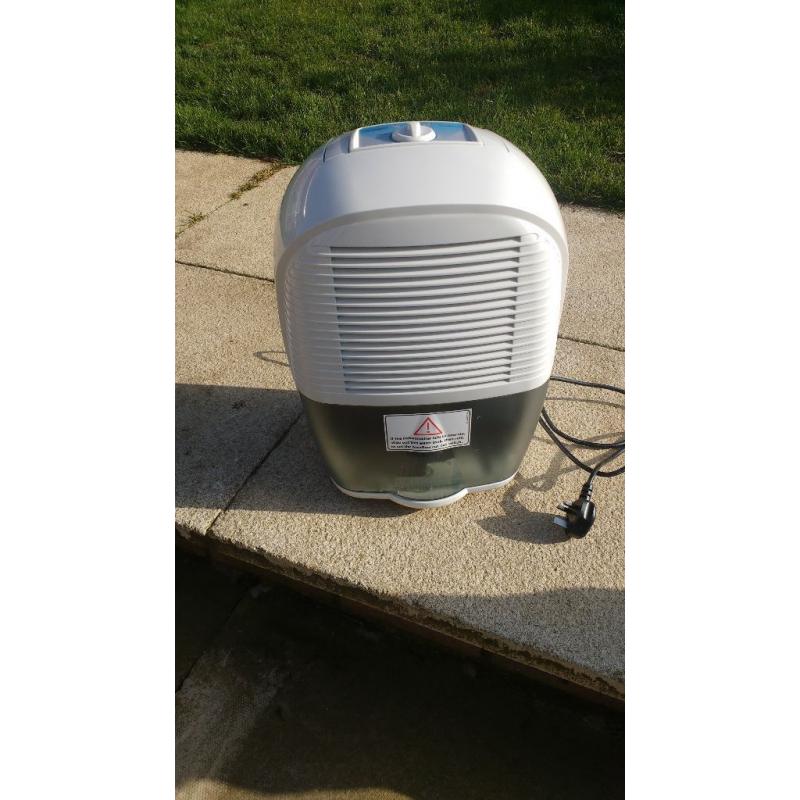 DEHUMIDIFIER SUITABLE FOR A CARAVAN OVERWINTERING.