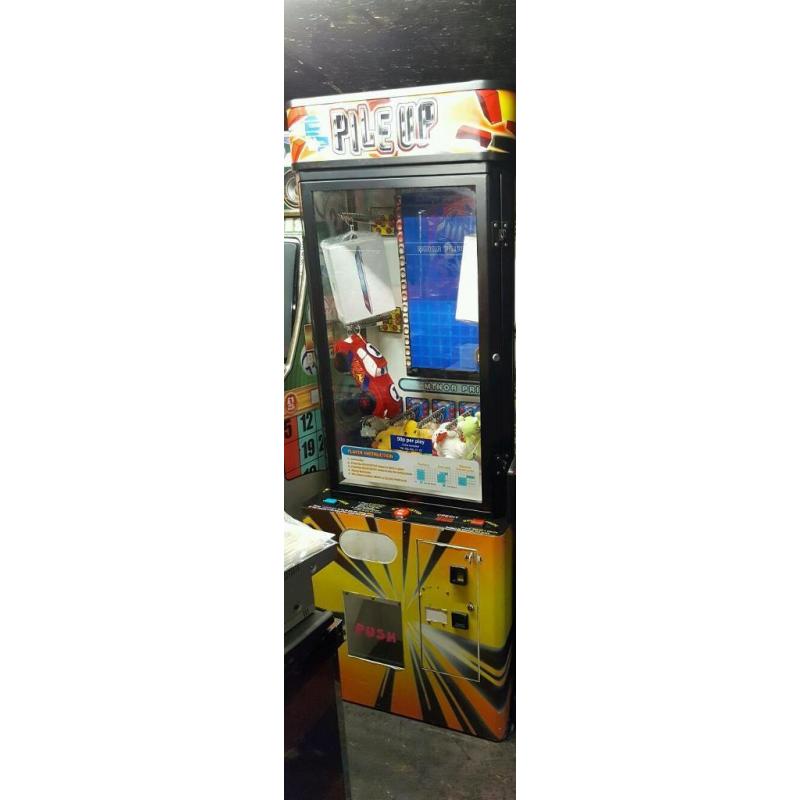 Coin operated swp skill with prize arcade machine plus stock