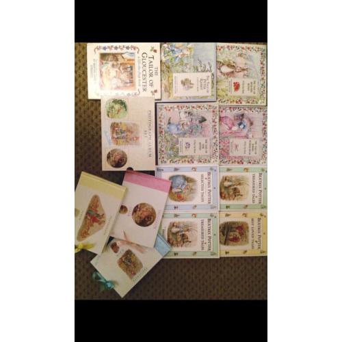 Beatrix potter books & a photo album selection