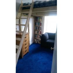 A double bed with views to the very top of Arthur's Seat!