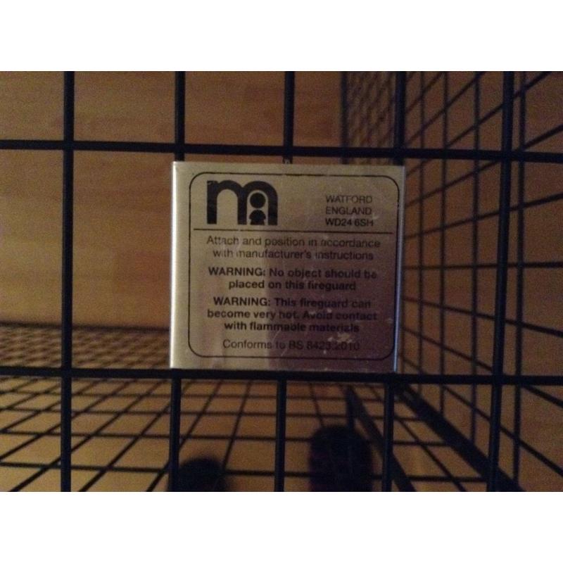 Mothercare black extendable fireguard