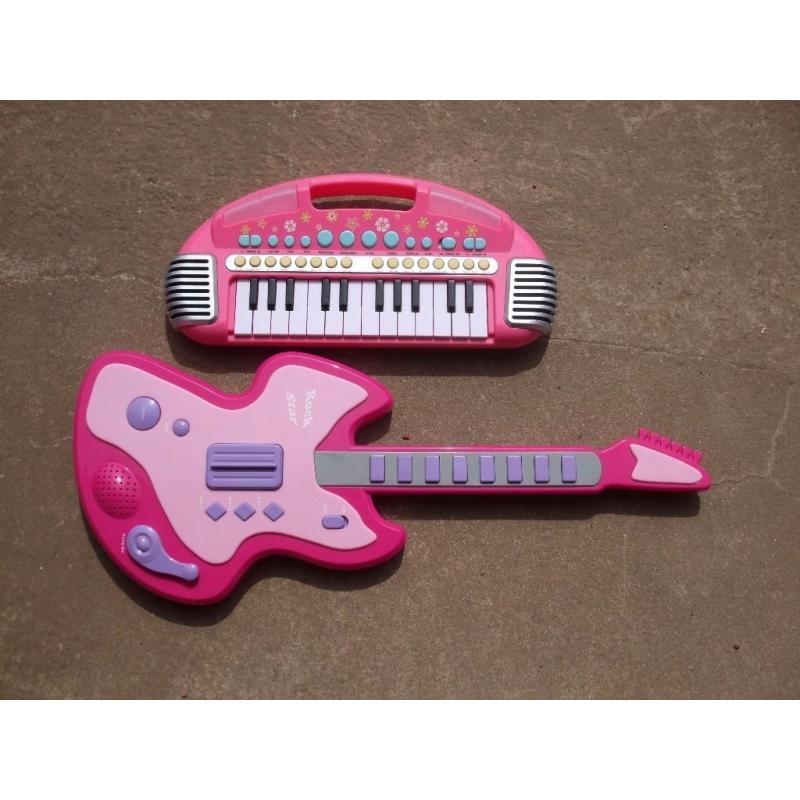 child toys ELC Carry Along Keyboard and Chad Valley Guitar musical in pink toy