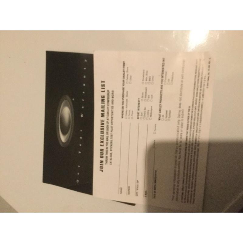 Oakley shades with 1 year guarantee certificate