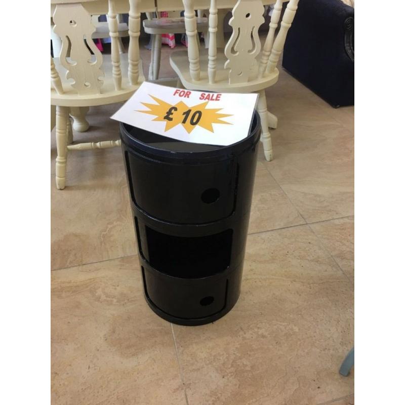 Cylindrical black plastic storage unit in excellent condition