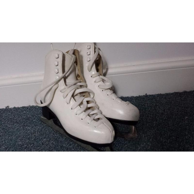 Ladies size 4 ice skates with bag