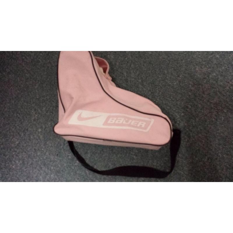 Ladies size 4 ice skates with bag