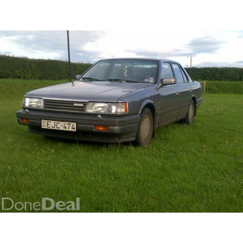 +200Bhp...RWD...5 speed manual...280Km/H...swap for ride on lawnmower,or bike.