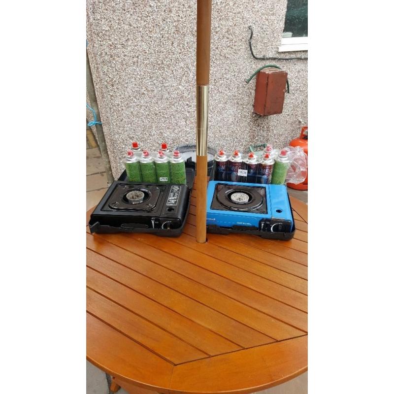 2x camling stoves and 12x gas bottles