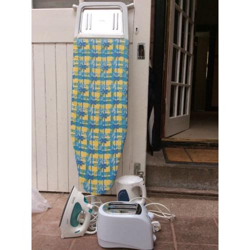 Ironing board, iron, toaster and kettle