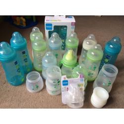 MAM bottle feeding kit inc anti colic bottles, bottle seals and training cup.