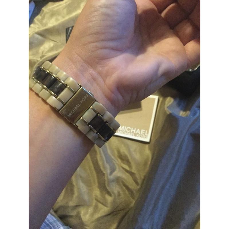 Michael Kors ivory tortoise gold watch, very good condition.