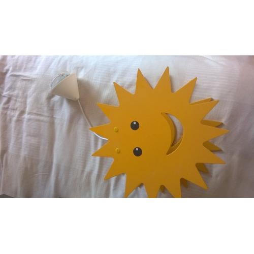 A yellow sun ceiling light