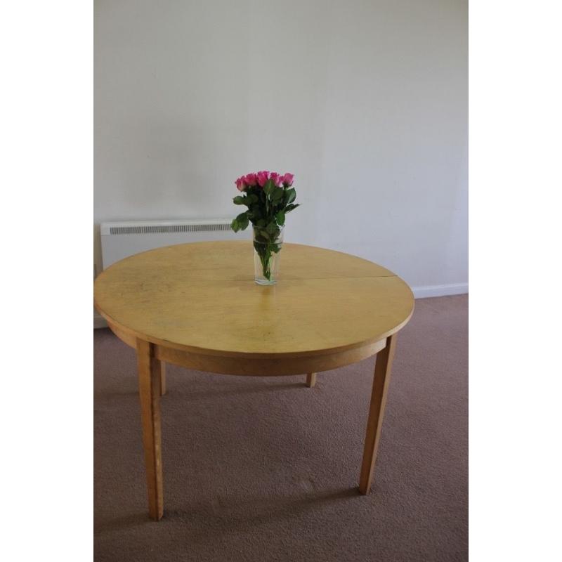 Wooden Round Dining Table for just a tenner