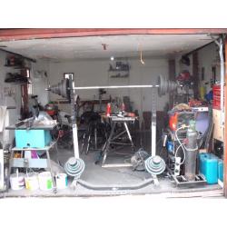 squat stand and barbell and weights