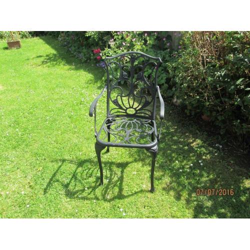 2 black metal garden arm chairs
