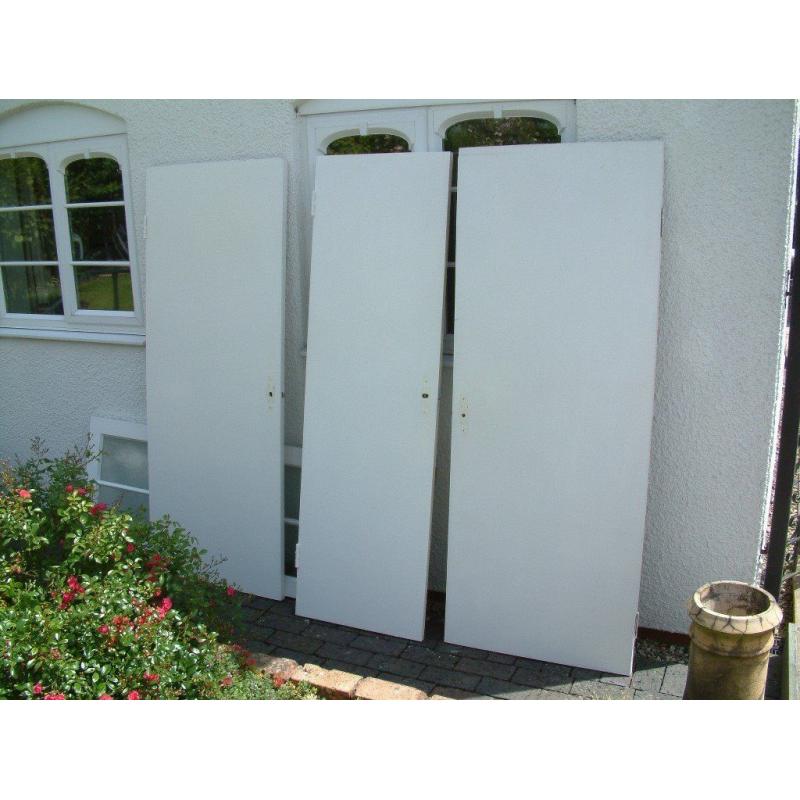3 plain flat wooden internal doors. Various sizes.