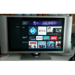 32" LCD TV - wider than 32" with side speakers