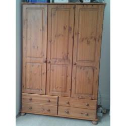 Pine three door, four draw wardrobe in excellent condition