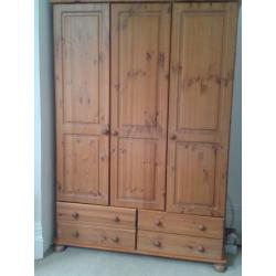 Pine three door, four draw wardrobe in excellent condition